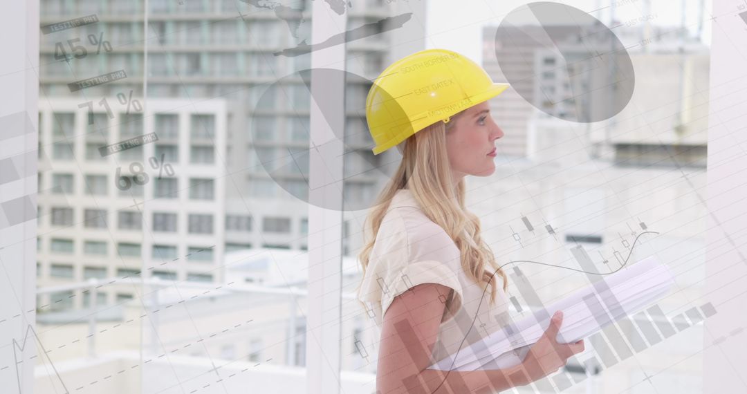 Female Architect Analyzing Construction Plans with Data Graphics