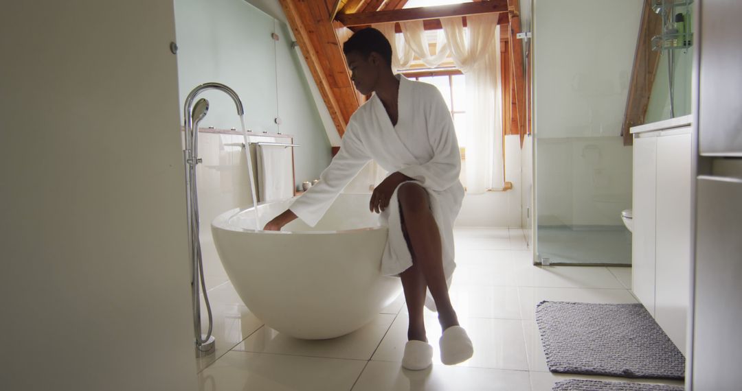 Woman Enjoying Luxurious Bath in Modern Bathroom Suite - Free Images, Stock Photos and Pictures on Pikwizard.com