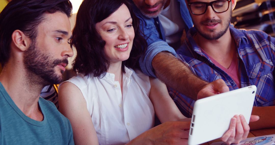Diverse Group Collaborating Using Tablet Technology