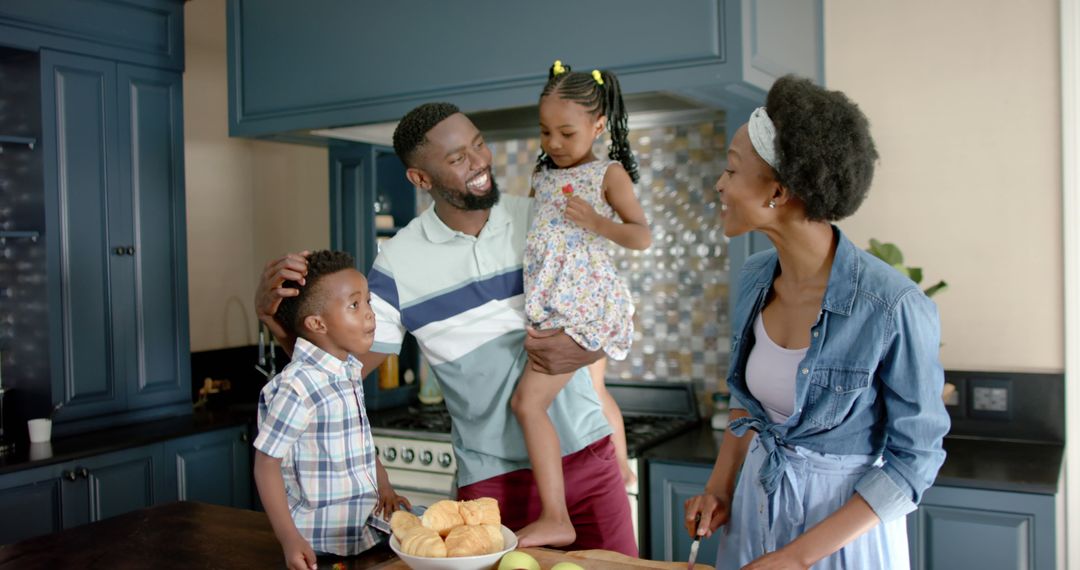 Happy African American Family Preparing Breakfast in Kitchen - Free Images, Stock Photos and Pictures on Pikwizard.com