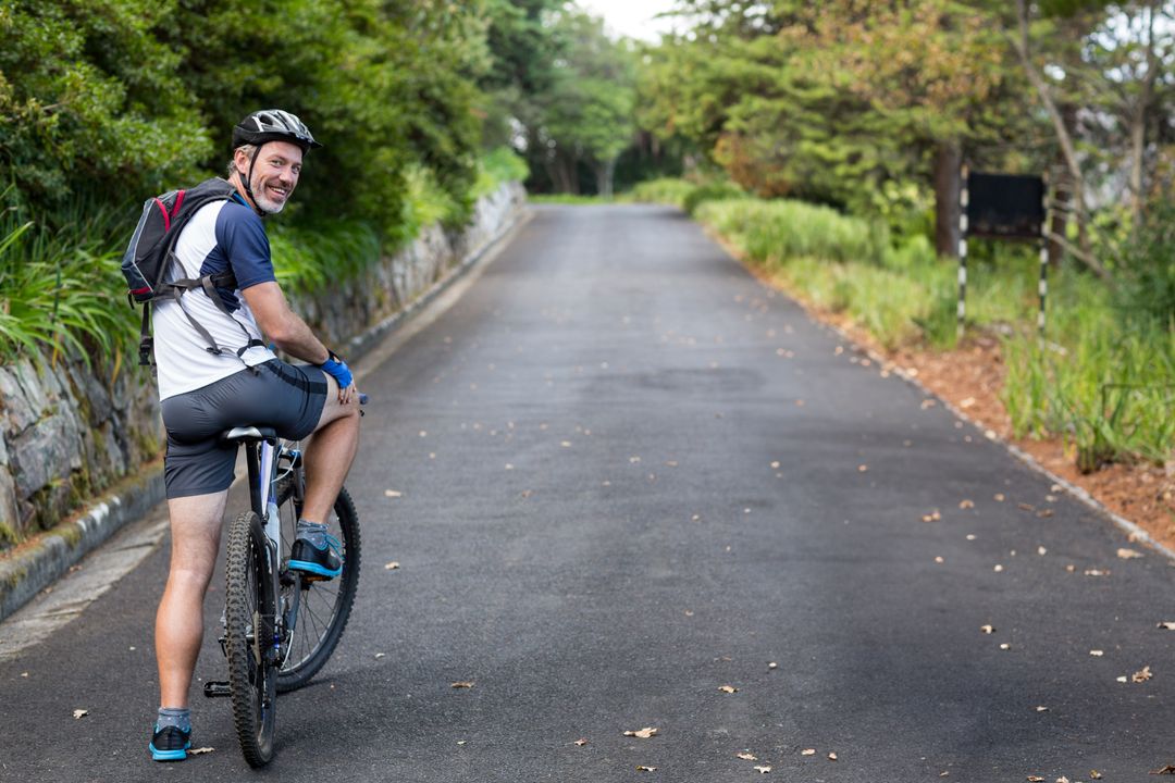 Cyclist Enjoying Spot in Nature on Sunny Day