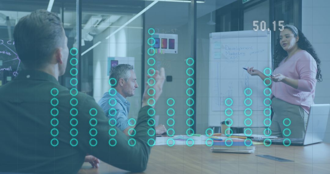 Team Analyzing Data Visualizations in Modern Office Meeting - Free Images, Stock Photos and Pictures on Pikwizard.com