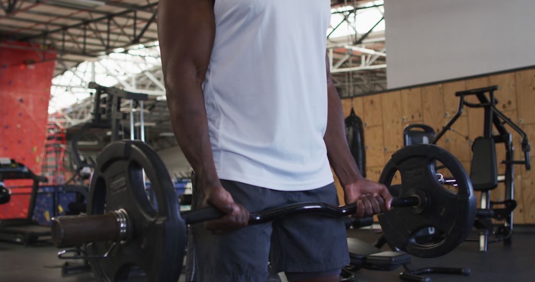 Close-Up of Athlete Lifting Weights in Gym - Free Images, Stock Photos and Pictures on Pikwizard.com