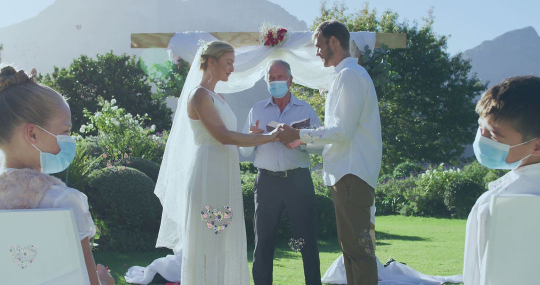 Bride and Groom Exchange Vows Wearing Masks Outdoors - Free Images, Stock Photos and Pictures on Pikwizard.com