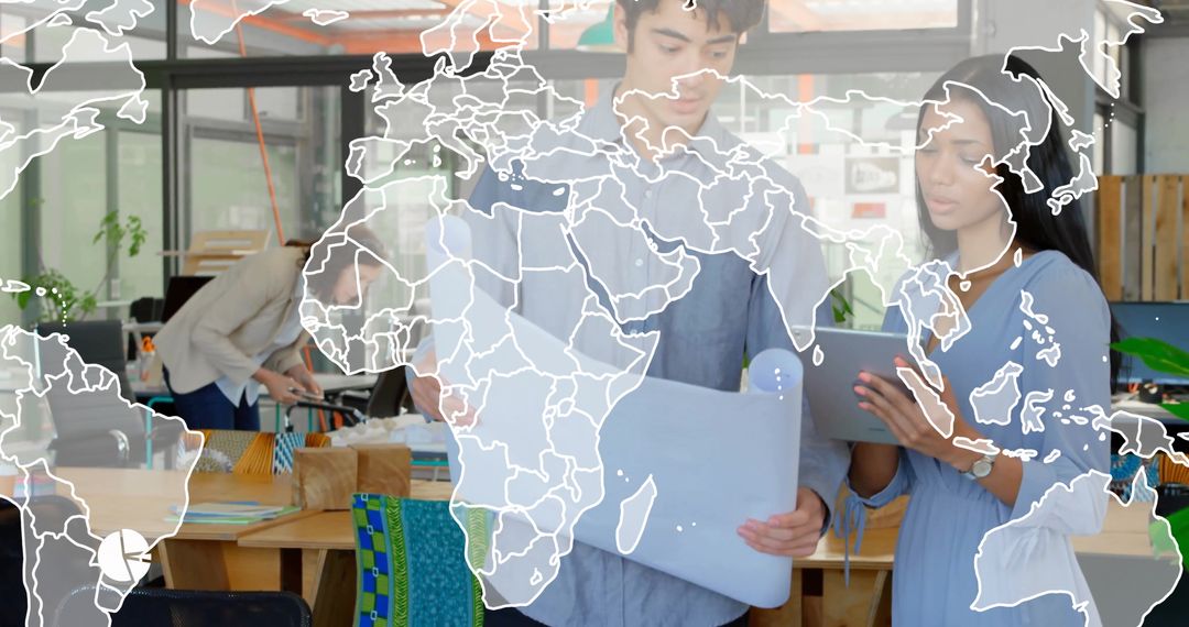 Colleagues Analyzing Blueprint in Modern Collaborative Workspace