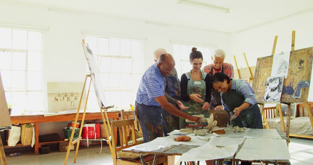 Diverse Group of Adults Engaged in Pottery Workshop - Free Images, Stock Photos and Pictures on Pikwizard.com