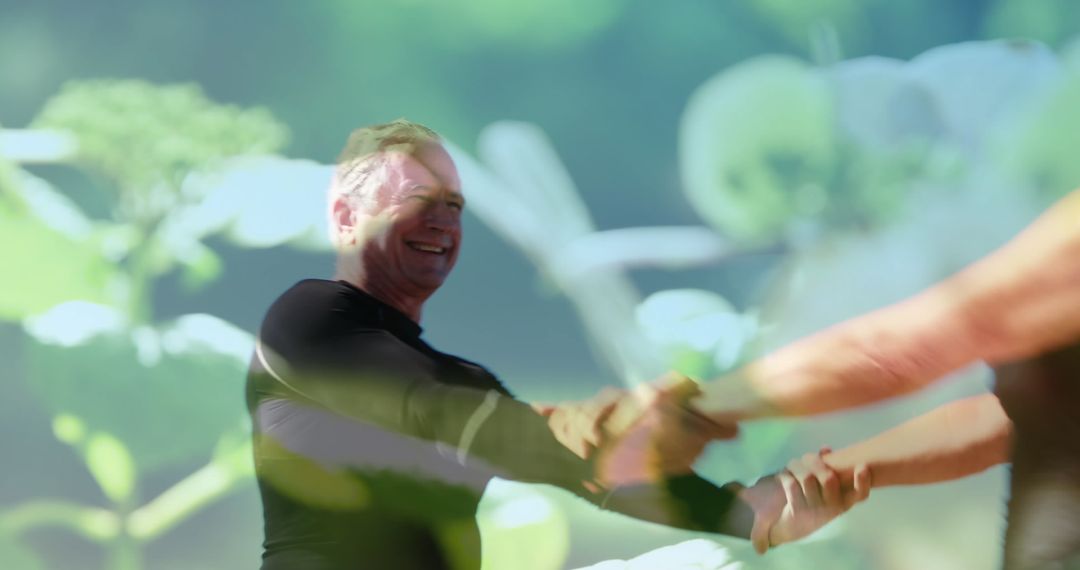 Senior Couple Dancing Happily with Nature Overlay