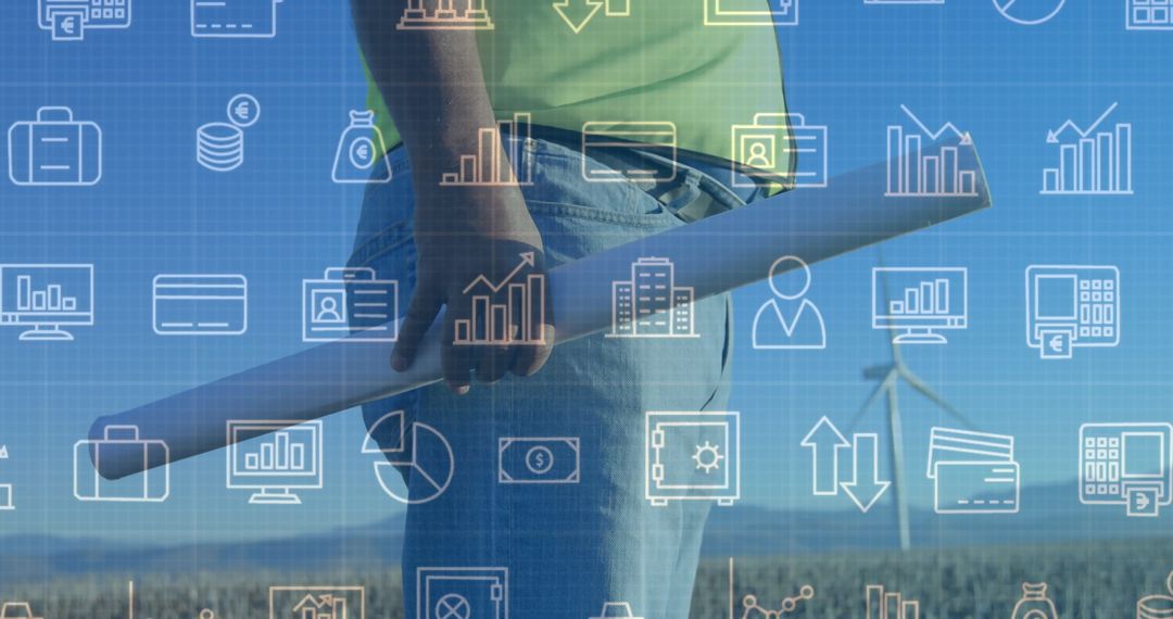 Engineer Holding Blueprint with Wind Turbine and Business Icons