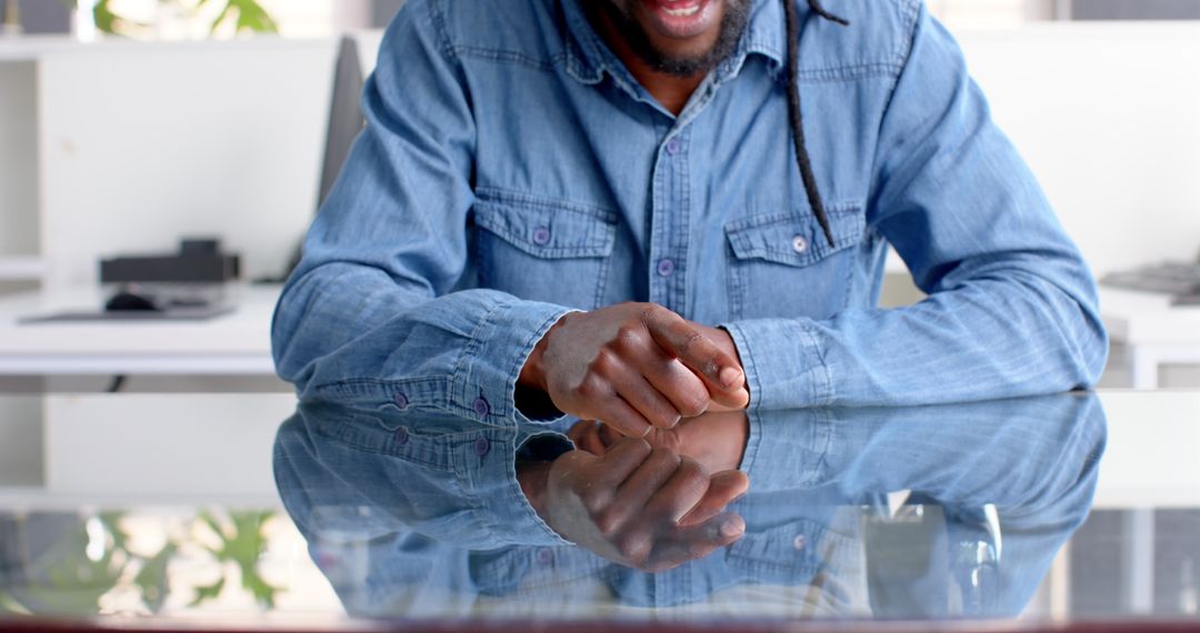 Tech-Savvy Professional Using Touchscreen Table in Office