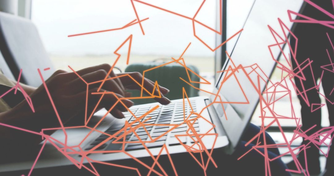 Modern Workspace: Typing on Laptop with Abstract Overlay for Innovation