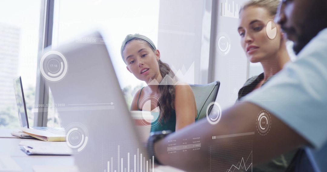 Diverse Business Team Analyzing Financial Data with Technology Interface