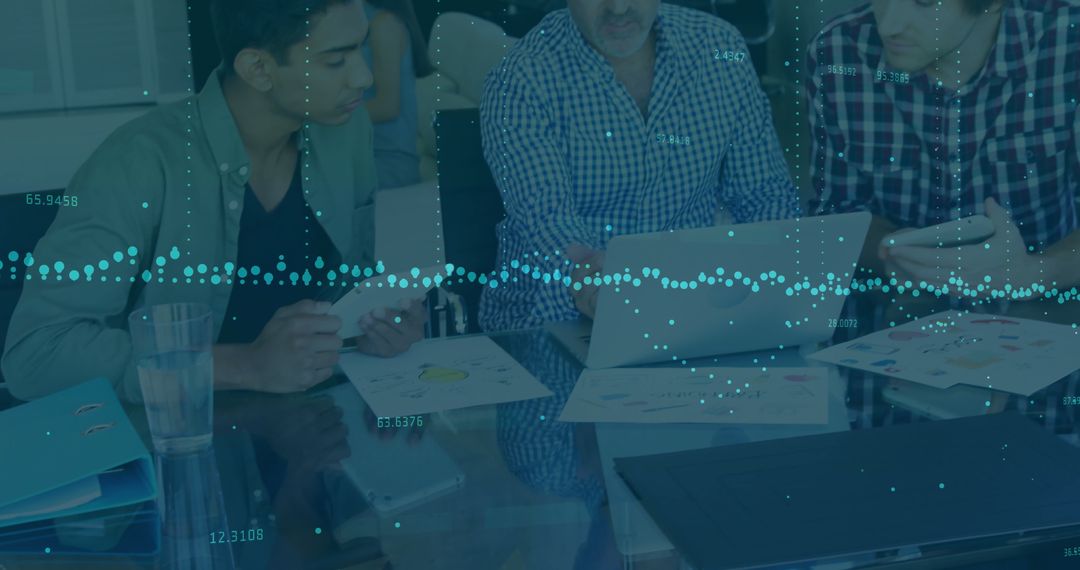 Business Team Collaborates on Financial Data Analysis
