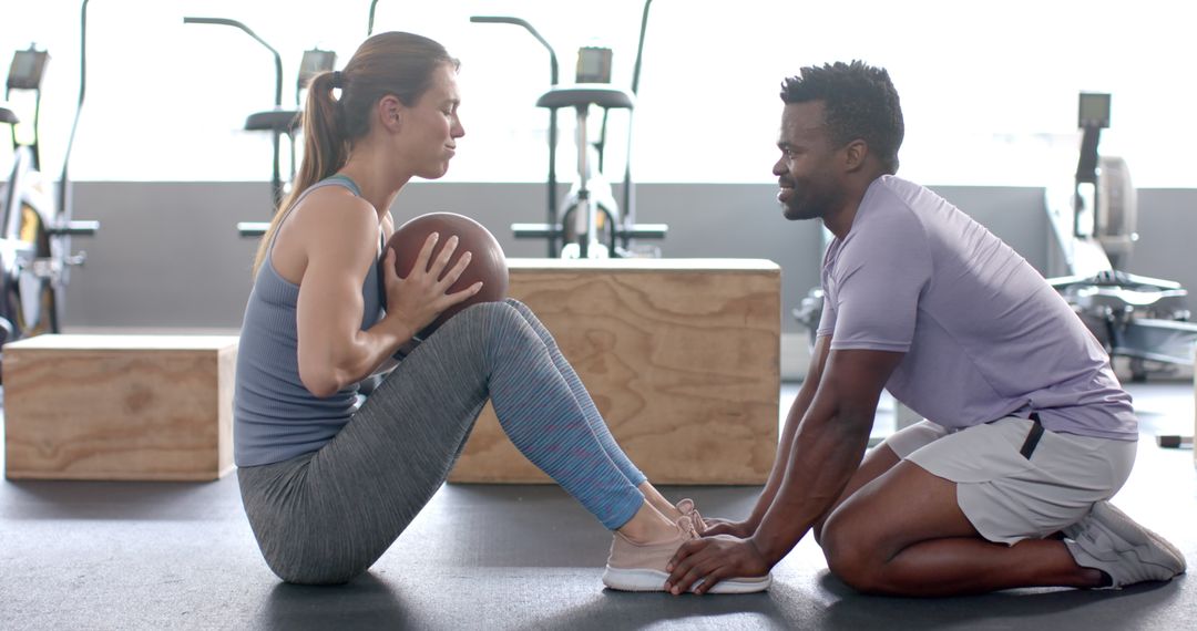 Diverse Workout Partners Training with Medicine Ball for Strength