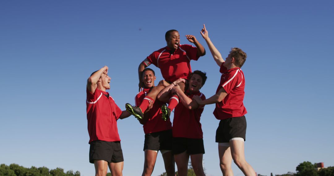 Rugby Team Celebrating Victory Outdoors - Free Images, Stock Photos and Pictures on Pikwizard.com