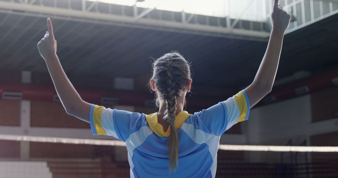 Young Caucasian woman celebrates a victory on the sports field - Free Images, Stock Photos and Pictures on Pikwizard.com