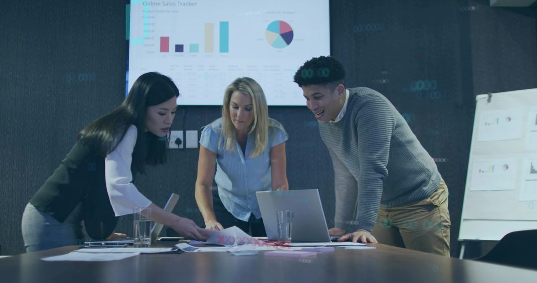 Collaborative Team Analyzing Sales Data in Modern Boardroom Environment