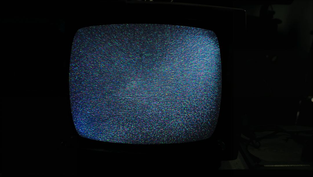 Vintage CRT Television Displaying Static Screen Snow