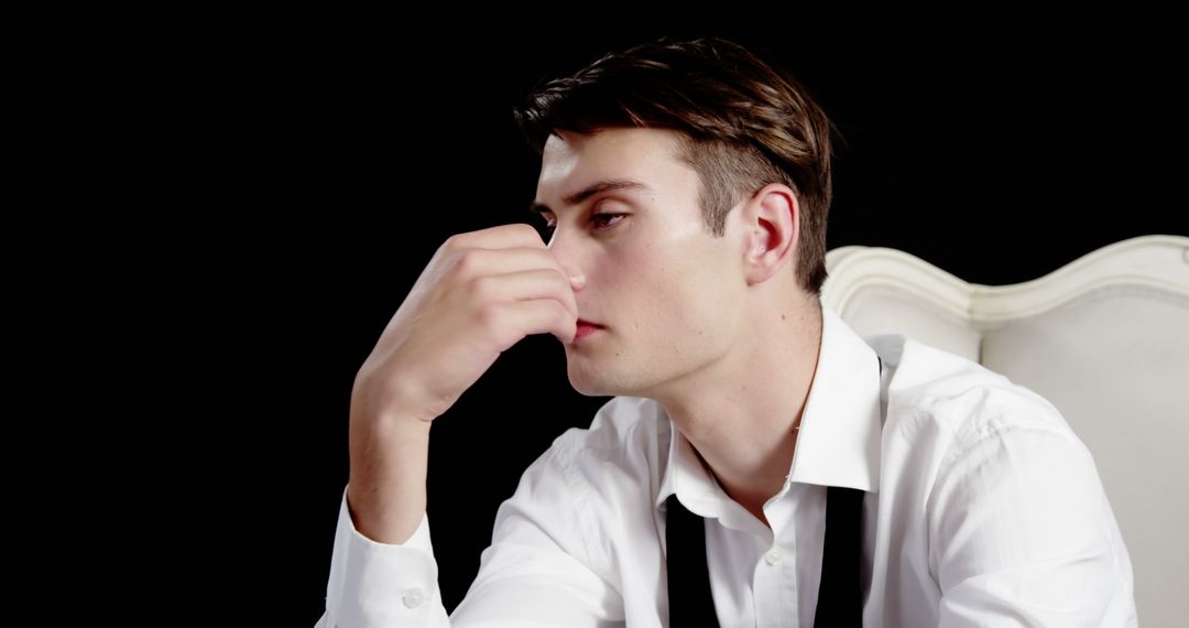 Stressed Young Man in Formal Wear Contemplating Thoughts - Free Images, Stock Photos and Pictures on Pikwizard.com