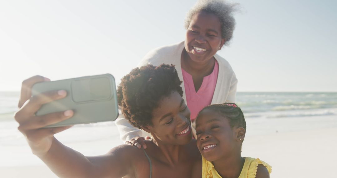 Three Generations of African American Women Taking Selfie on Beach - Free Images, Stock Photos and Pictures on Pikwizard.com