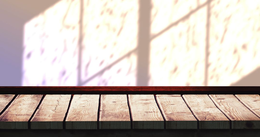 Sunlit Window Shadows Over Rustic Wooden Table Surface