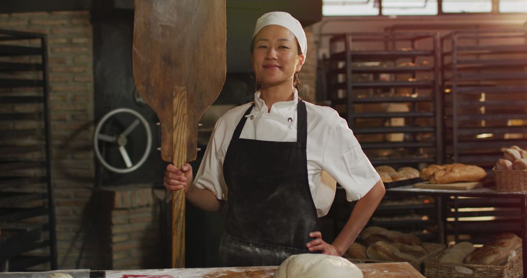 Confident Female Baker in Artisan Bakery - Free Images, Stock Photos and Pictures on Pikwizard.com