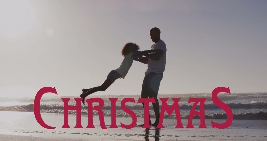 Joyful Father and Daughter Playing on Beach During Sunset