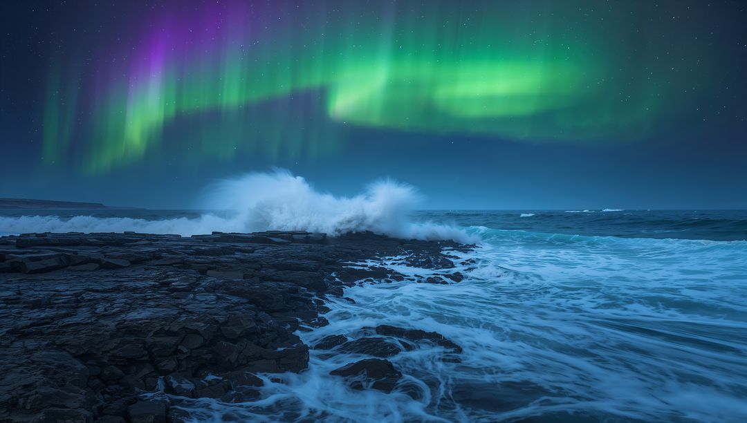 Crashing Waves and Glowing Aurora Illuminating Rugged Rocky Coastline Under Starry Sky