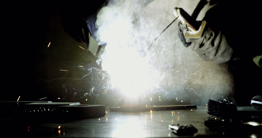 Close-up of Welding Process with Sparks and Smoke in Workshop - Free Images, Stock Photos and Pictures on Pikwizard.com