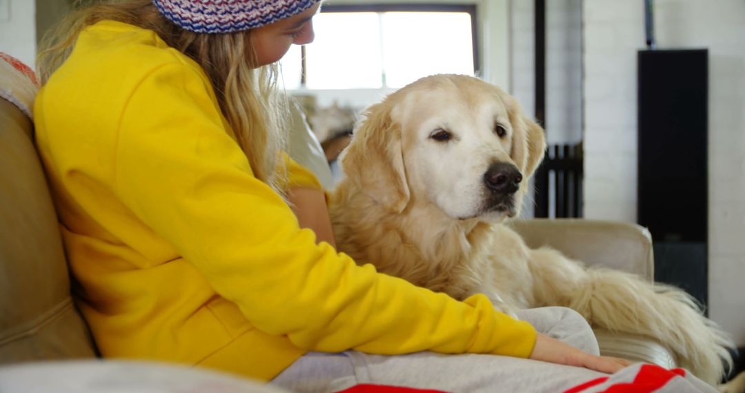 Woman Relaxing at Home with Golden Retriever - Free Images, Stock Photos and Pictures on Pikwizard.com