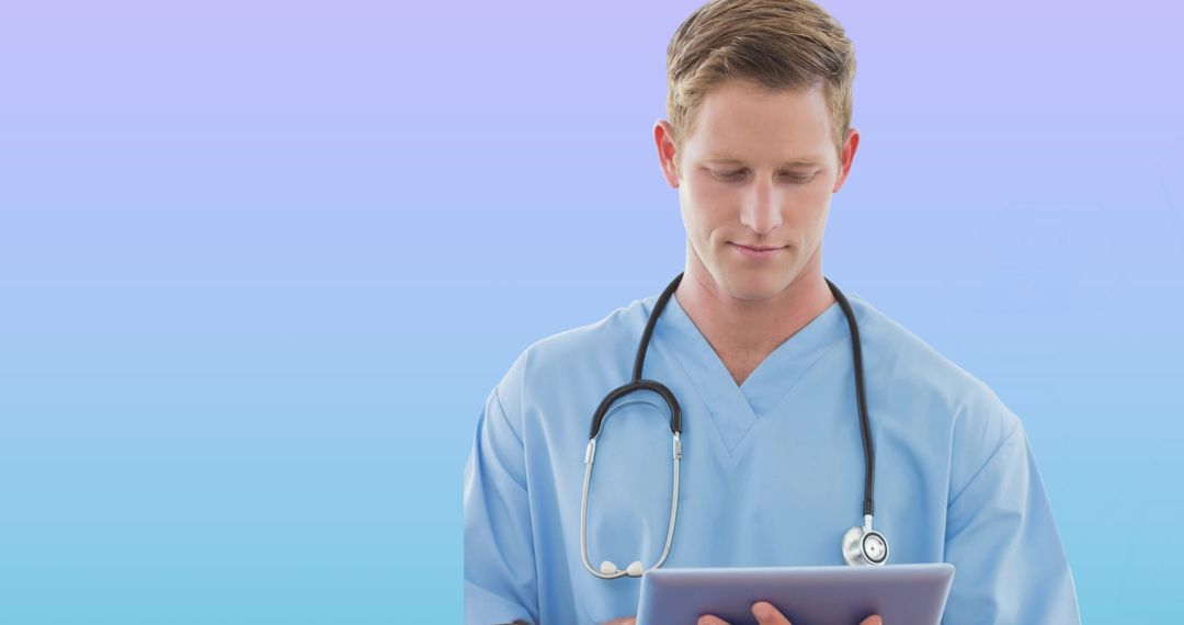 Caucasian Male Doctor Using Tablet with Blue Gradient Background