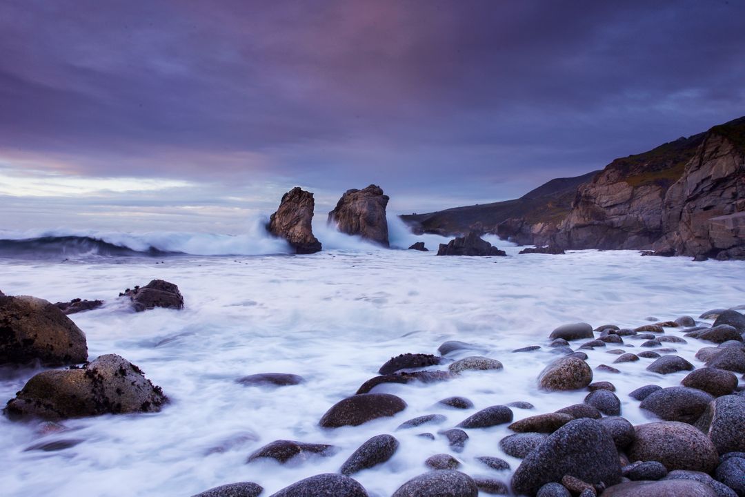 Dramatic Coastal Landscape with Rocky Shorelines at Dusk - Free Images, Stock Photos and Pictures on Pikwizard.com