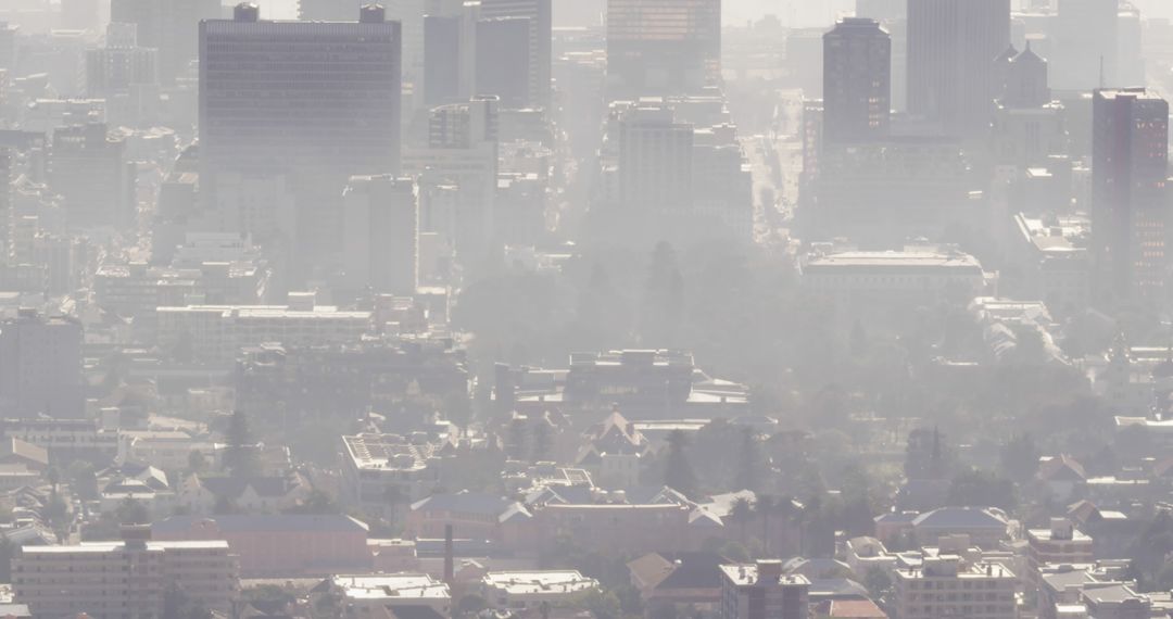 Urban Skyscrapers Shrouded in Thick Fog Reducing Visibility