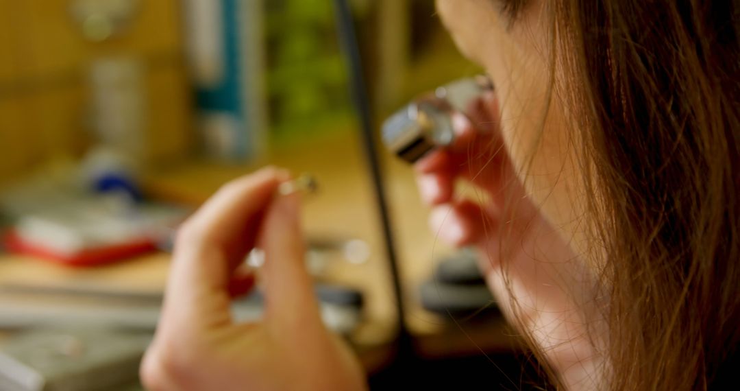 Close-Up of Jeweler Examining a Stone with Loupe - Free Images, Stock Photos and Pictures on Pikwizard.com