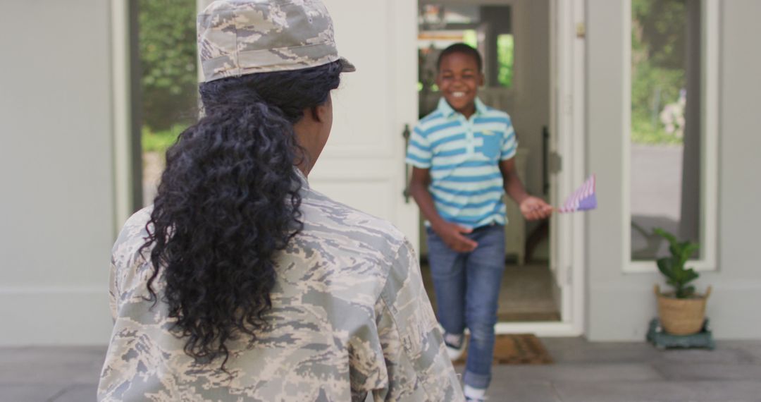 Joyful Reunion Between Military Mother and Son at Doorstep