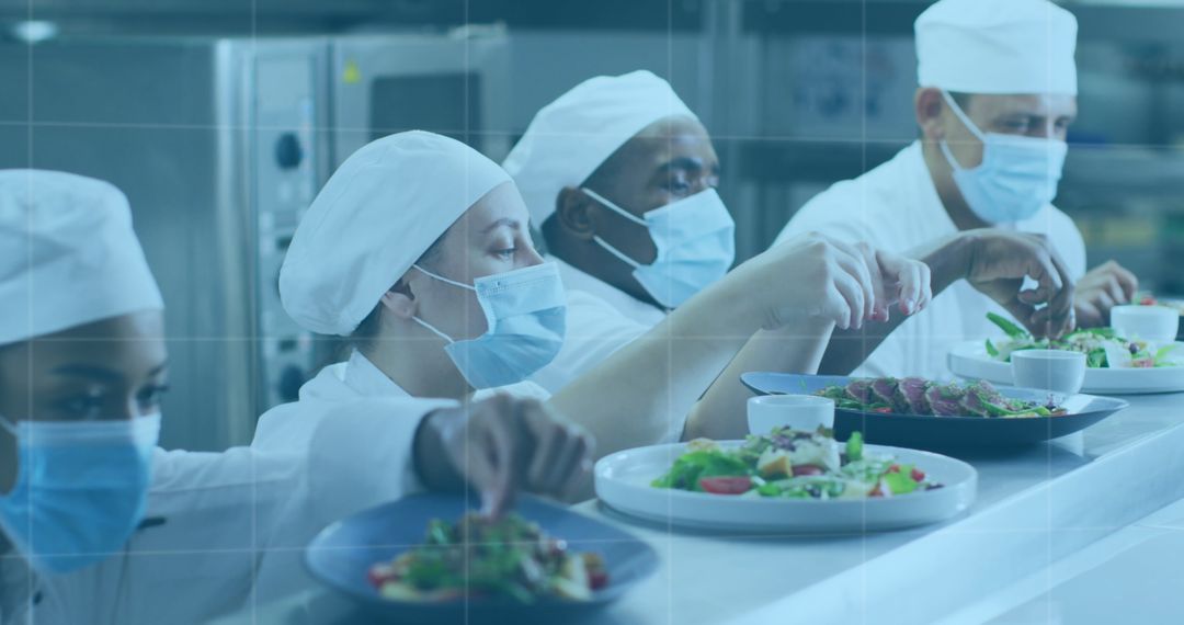 Diverse Chefs Skillfully Plating Gourmet Meals in Professional Kitchen