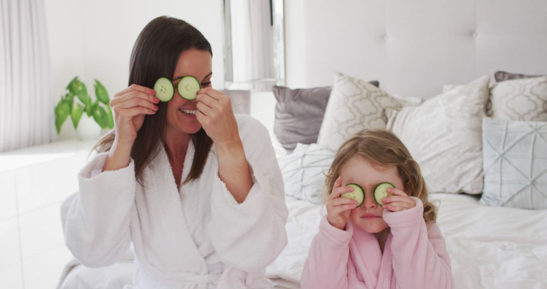 Mother and Daughter Enjoying Spa Day with Cucumber Slices at Home - Free Images, Stock Photos and Pictures on Pikwizard.com