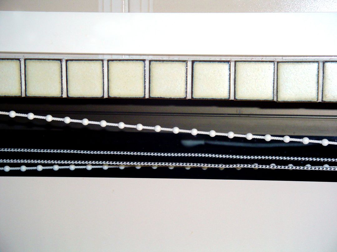 Close-up of Roller Blind Chains and Track Mechanism - Free Images, Stock Photos and Pictures on Pikwizard.com