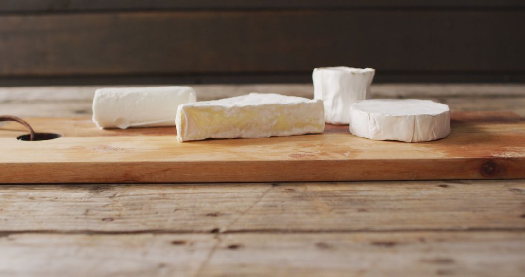 Assorted Cheese Selection on Rustic Wooden Board - Free Images, Stock Photos and Pictures on Pikwizard.com