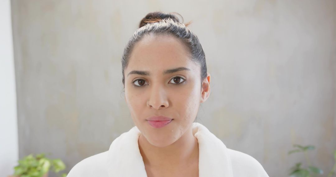 Woman in Bathrobe with Nose Ring Embracing Tranquility