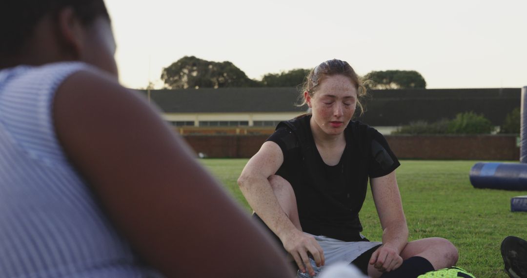 Diverse Rugby Team Resting During Training on Field - Free Images, Stock Photos and Pictures on Pikwizard.com