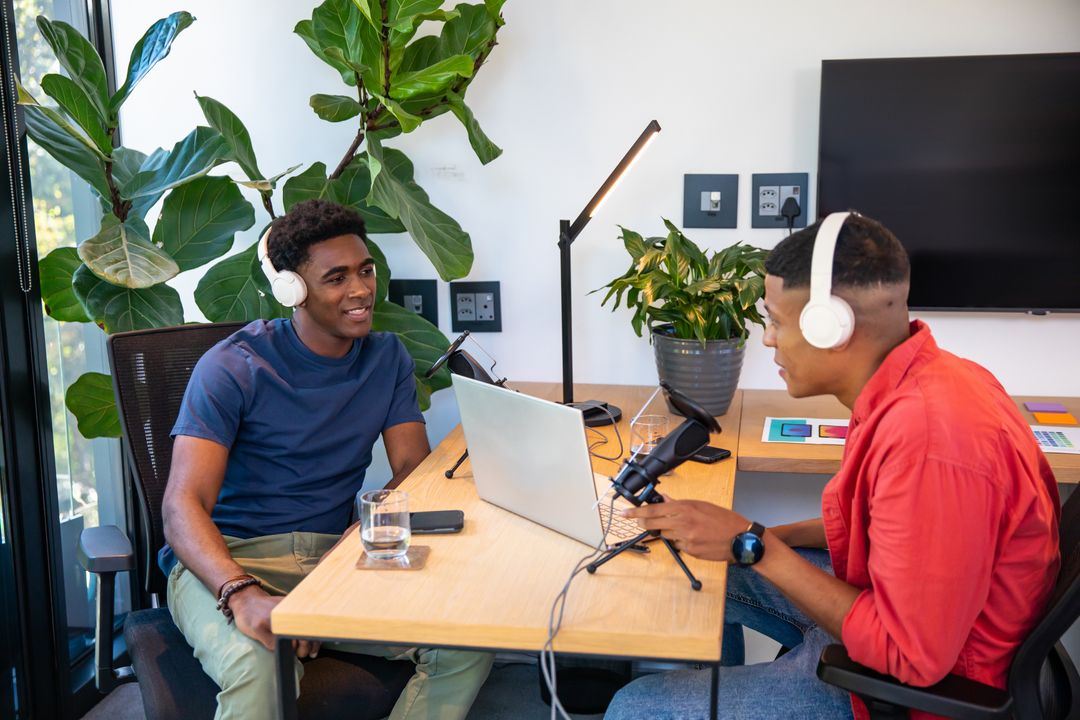 Young Professionals Recording Podcast in Modern Office Studio