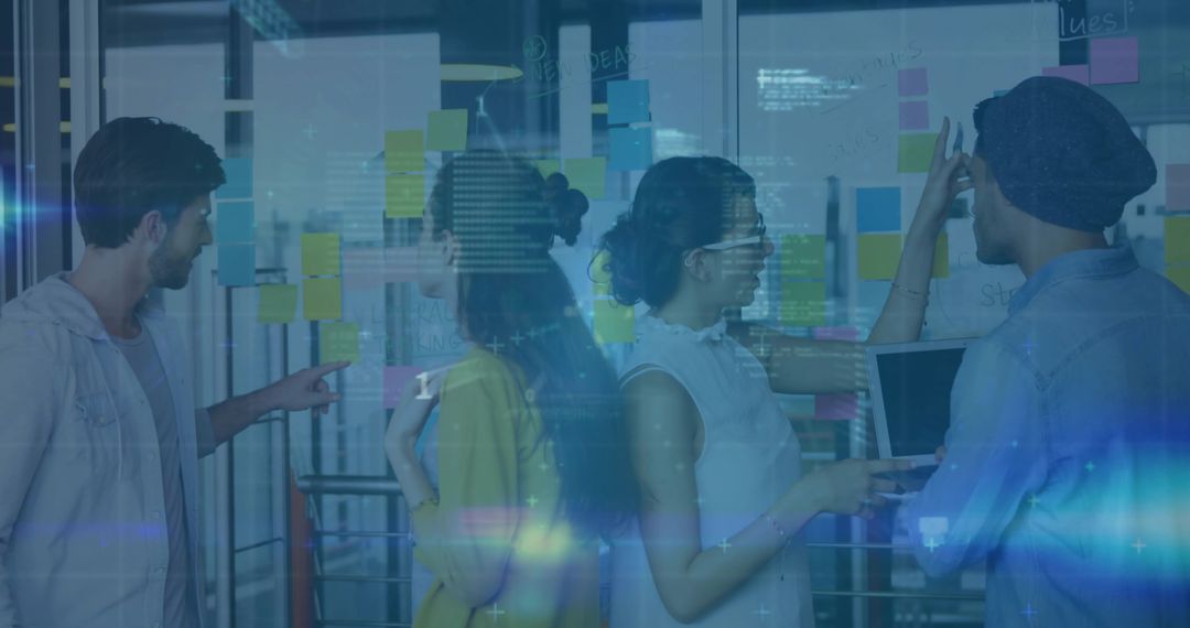 Creative Team Collaborating on Innovation Strategies in Modern Office