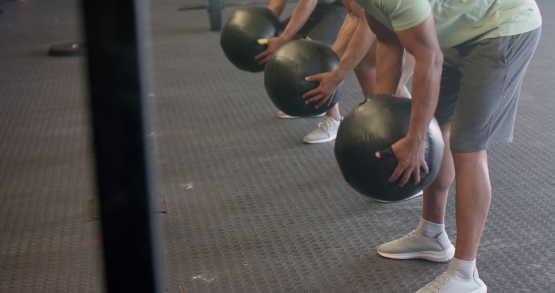 People Exercising with Medicine Balls in Gym - Free Images, Stock Photos and Pictures on Pikwizard.com