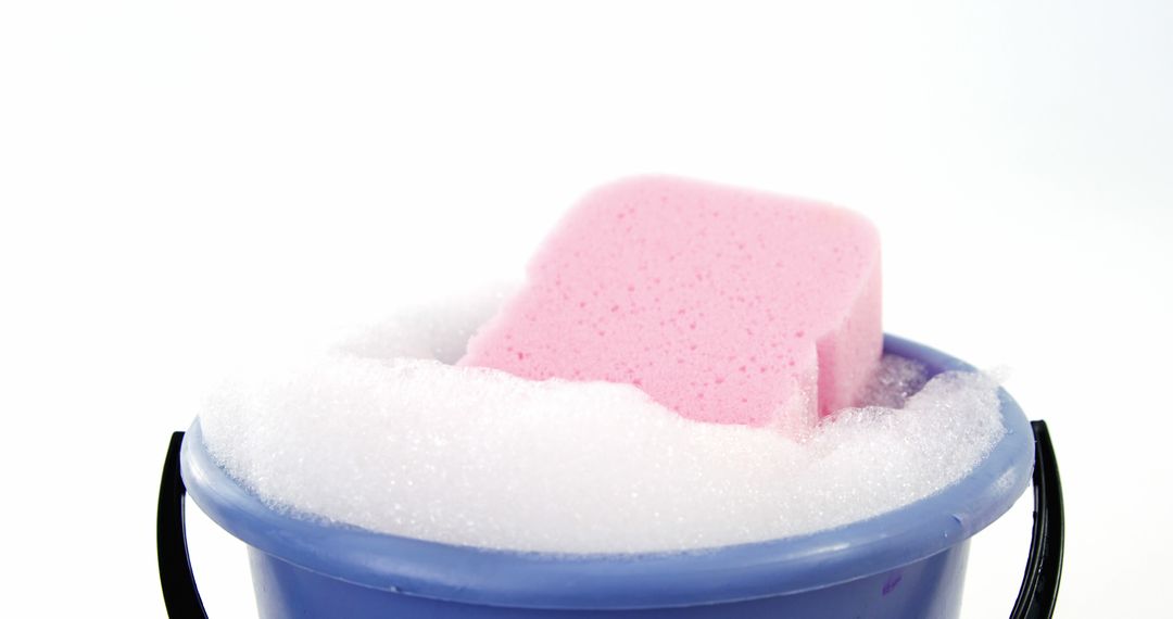 Pink Sponge on Soapy Suds in Blue Bucket for Cleaning - Free Images, Stock Photos and Pictures on Pikwizard.com