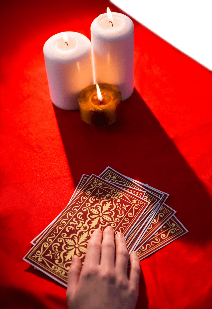 Fortune Teller Reading Tarot Cards with Candles on Red