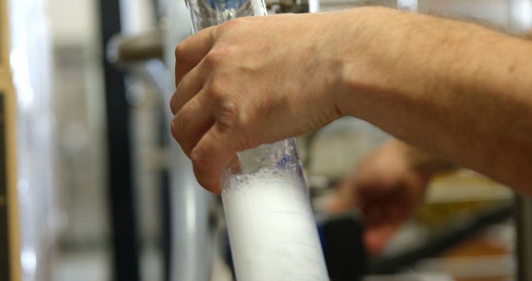 Scientist Using Glassware in Laboratory Setting - Free Images, Stock Photos and Pictures on Pikwizard.com