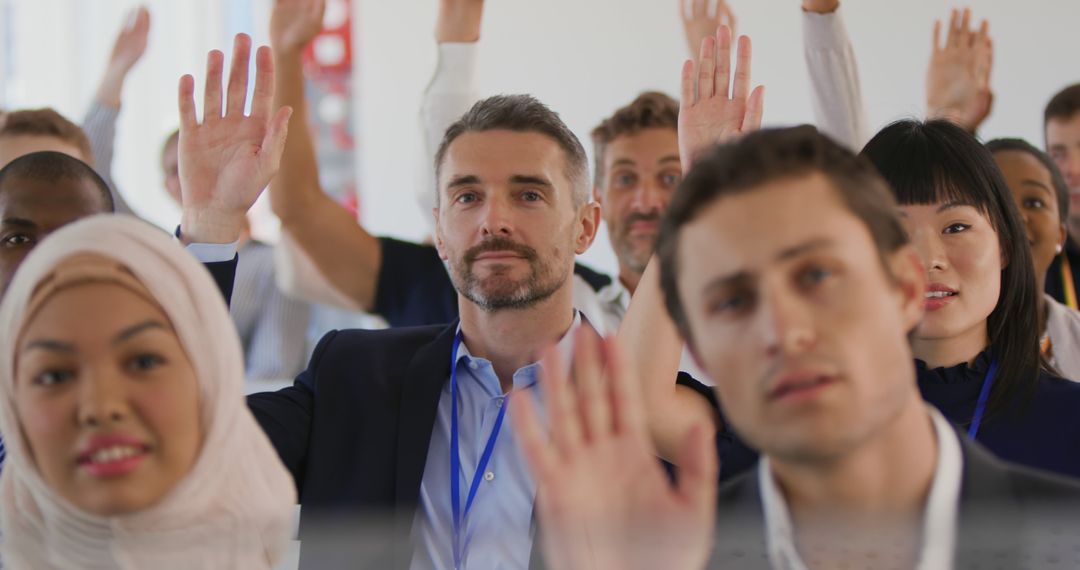 Diverse Business Team Raising Hands in Conference Meeting - Free Images, Stock Photos and Pictures on Pikwizard.com