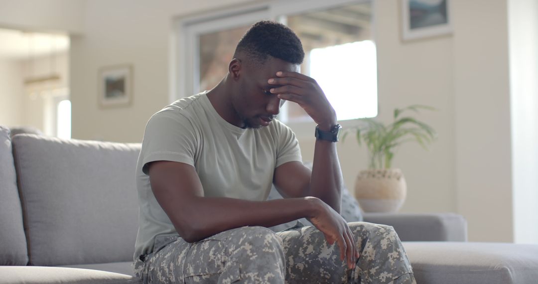 Military Veteran Depressed and Reflecting Alone at Home - Free Images, Stock Photos and Pictures on Pikwizard.com