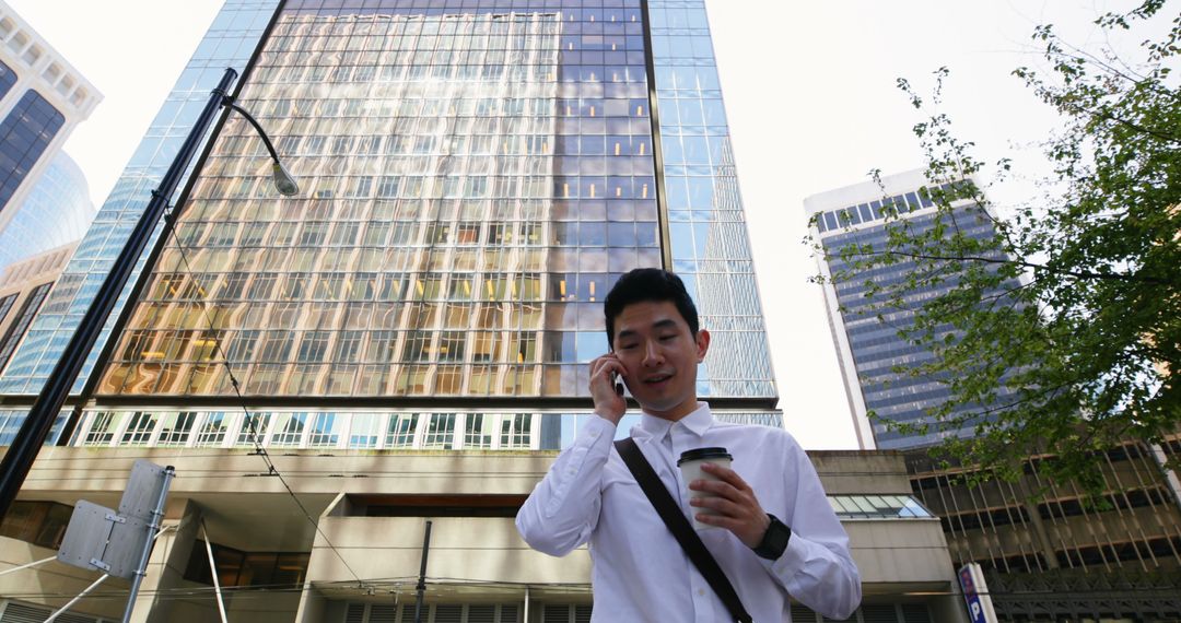 Young Professional Having Phone Call in Urban Business District