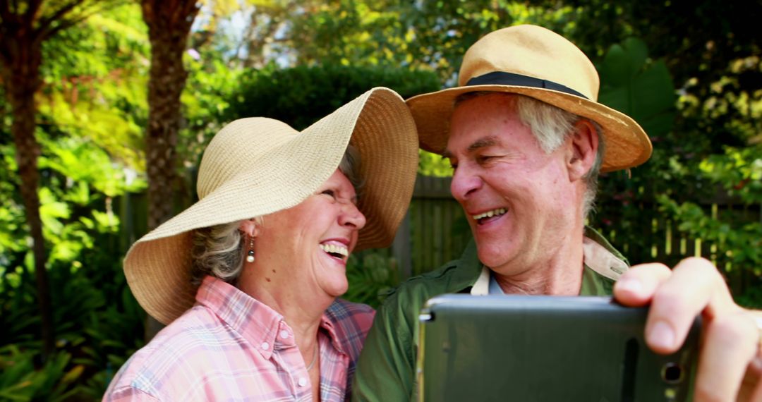 Happy Senior Couple Taking Selfie on Summer Day Outdoors - Free Images, Stock Photos and Pictures on Pikwizard.com